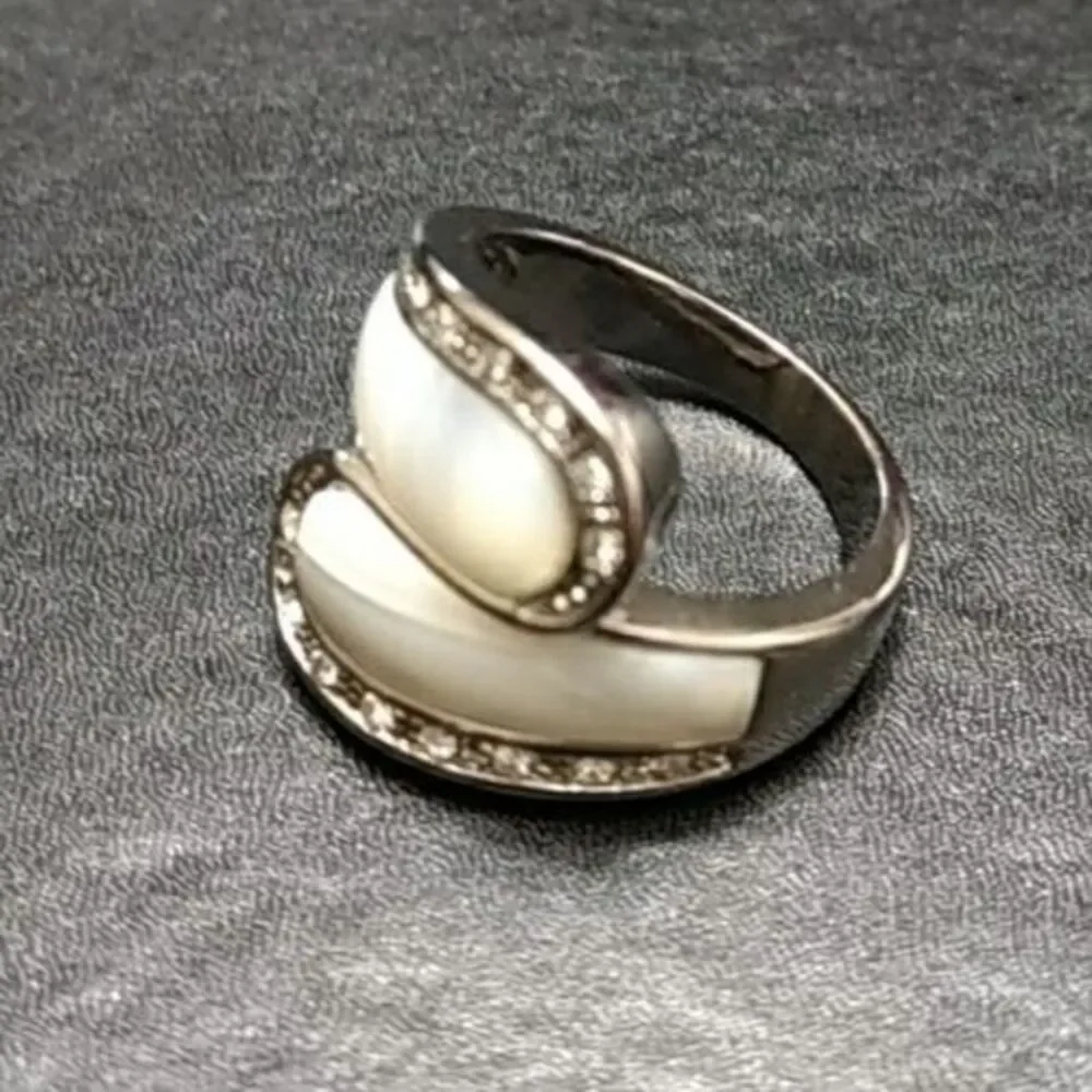 Silver tone ring with white stone Size 8